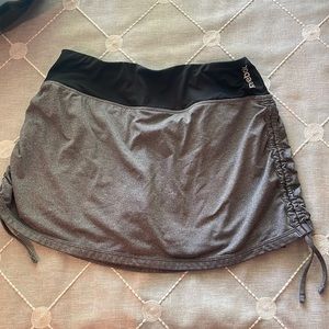 Reebok tennis skirt size SMALL It has shorts underneath and length is adjustable
